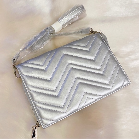 Francesca's Collections Handbags - NWT Francesca’s silver quilted wallet/clutch